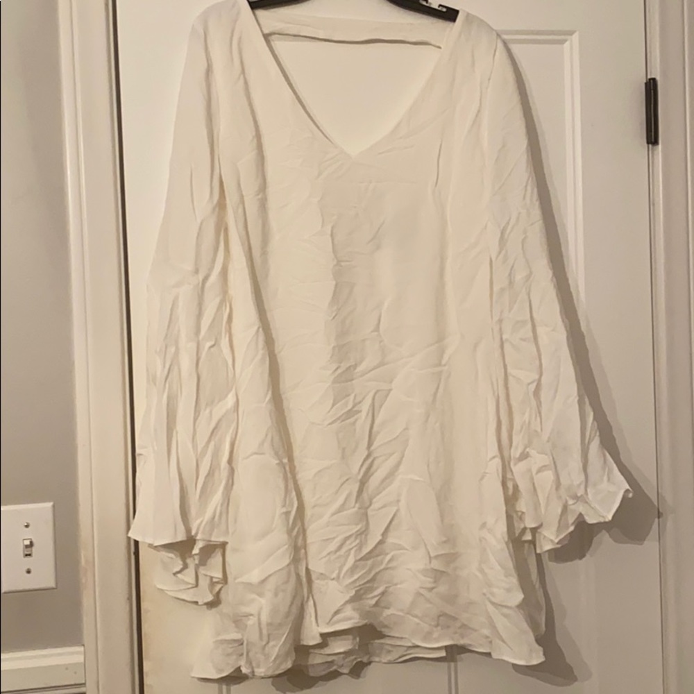 White Lulu’s Large bell sleeve dress